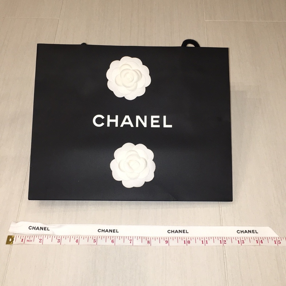 SOLD. Chanel shopping bag with 30inches ribbon